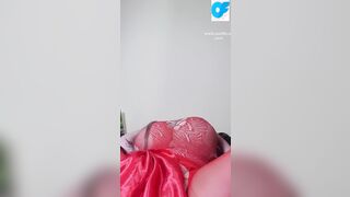 View nasty Susi lying on back having fun with vibrator between boobs