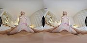 Draped in her finest, blonde beauty Jazlyn Ray prepares to greet her client with a look designed for maximum impact