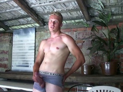 Handsome blonde boy David Robinson jerks his big dick