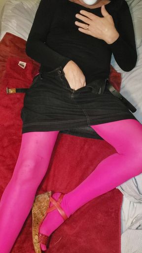Sexy crossdresser teasing in bed.