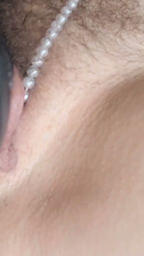 Closeup amateur milf Munichgold with long labia and hairy pussy does it for you in a pearl thong   Clip 2