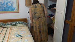 After being fucked, I film my stepmother getting dressed and it gets me really hard.