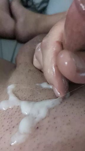 Blowing a load on my belly.
