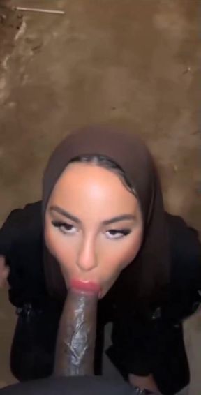Middle Eastern woman giving blowjob