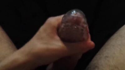 Amateur chap is stroking his pecker with a gummy sex toy