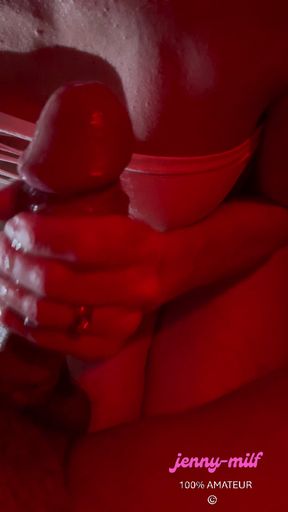 Jenny jerks off a big juicy cock