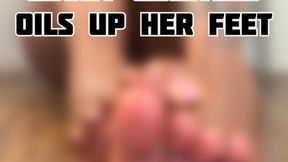 Ebony Giantess Oils up her feet