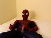 spiderman jerks off and cums all over his suit