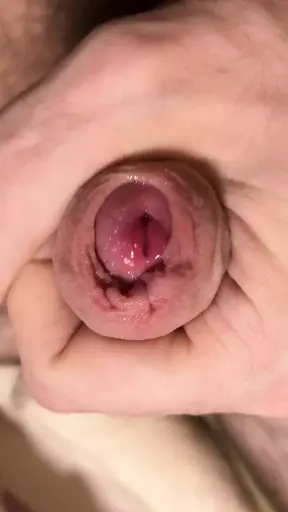 Extreme close-up jerking off until I blow a messy cumshot in my foreskin and all over my hand