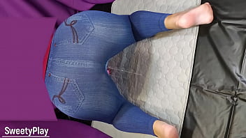 Big ass in jeans pissing with vibrator