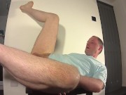Kudoslong strips for the camera till he is in just a t-shirt and inserts a beer bottle up his anus