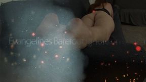 Eve barefoot on the couch 1