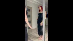 Dance sexy redhead in long black tight dress