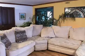 Busty MILF takes two hard cocks in wild threesome