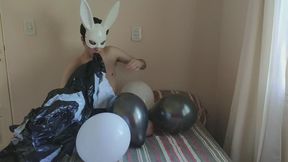 Bunny Blowing Up Inflatable Whale