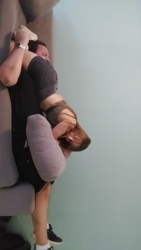 Brunette wrestler dominates blonde in face-sitting match