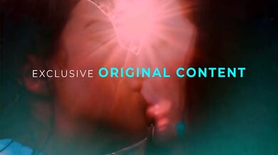 Natasha Nice explores intimate moments in lace stockings and soft light