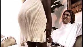 Dark beauty dominates the room in scorching XXX interracial encounter