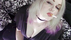 Dangling a red in a black dress
