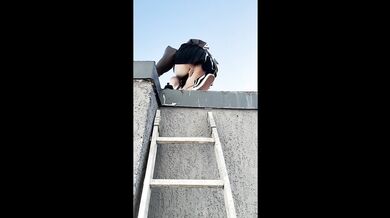 Tattooed redhead teases on rooftop with 18 year old blowjob