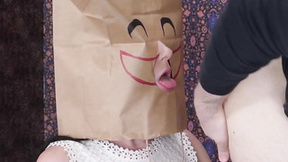 Bag headed submissive teen sucking