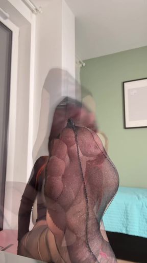 Stockinged feet teasing the camera