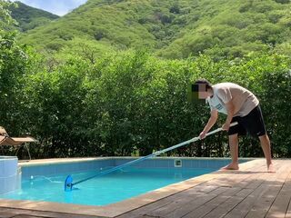 The guy who cleans the pool gets very hot when he sees his bosses tanning in the pool and they end u