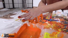 Topless Belle Plays Around with Paint Using Her Perfect Feet and Hands