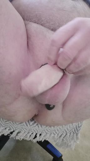 Grandpa Sits in Armchair and Plays with His Little Cock with a Vibrator Around His Little Cock
