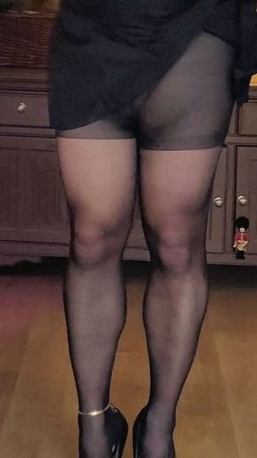 Crossdresser win black tights, heels and dress