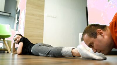 Kinky fitness instructor is worshipping sexy feet of these two girls