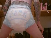 Sissy fuckdoll rides dildo while diapered