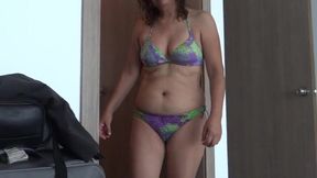My wife, a Latin mother, exhibits herself on the beach and masturbates in front of the hotel owner,