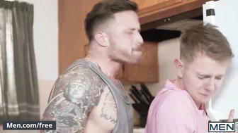 Cute twink rides tattooed hunk's thick cock in rough gay sex