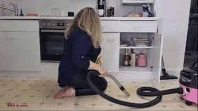 Mila - Vacuuming kitchen cabinet