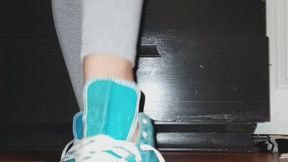 Stop trying to make me tie my shoes! They are smelly and I like them untied