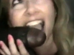 Amateur girl sucks and fucks BBC at Gloryhole