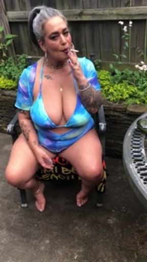 Outside smoking with thick Milf
