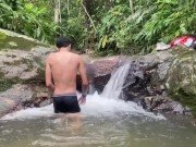 LATINO MASTURBATES IN A WATERFALL AND FILLS WITH MILK