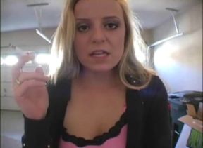 Blonde bitch smoking a cigarette in a close up video