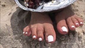 Marshmallow toenails in the sand_