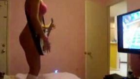 Girlfriend's big black ass jiggles when she plays guitar hero