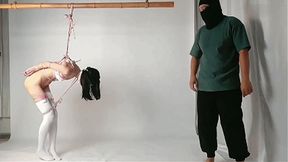 yumi11-The girl was suspended by her hands and brought to orgasm with a vibrator.