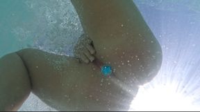 girl flashing ass with plug underwater
