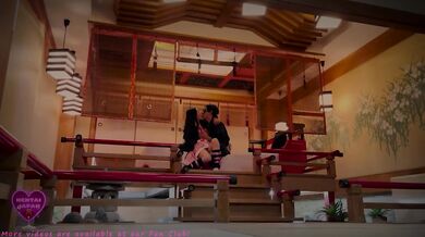 Nezuko rides the lift-and-carry ride in Yoshiwara’s red glow
