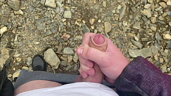 I jerk off a flaccid dick and cum on a mountain lake in nature! POV!