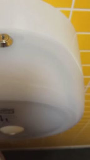 Horny German model in public toilet enjoys and pisses and watched by worker with leather