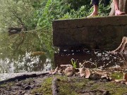 Stripping down naked inside a forest stroking my big skinny Cock at a lake and dipping my feet in