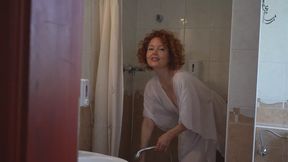 Wet look shower in a sensual white dress