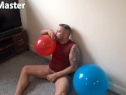 DILF blows up three balloons, pops one and cums on the other two PREVIEW
